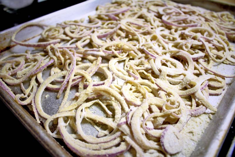 onions ready to roast on pan