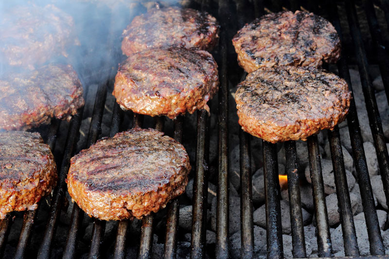 Perfect burger, gridiron burger hatch chilies gouda cheese colby cheese peppered bacon sugar-free mustard sugar-free ketchup sugar-free ranch dressing cucumber tomato salsa perfect hamburger patty caramelized onions