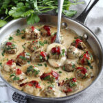 Rich gravy, seasoned ground beef topped with Lingonberry Jam. These Swedish Meatballs do not disappoint!