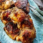 plated oven roasted chicken with seasoning